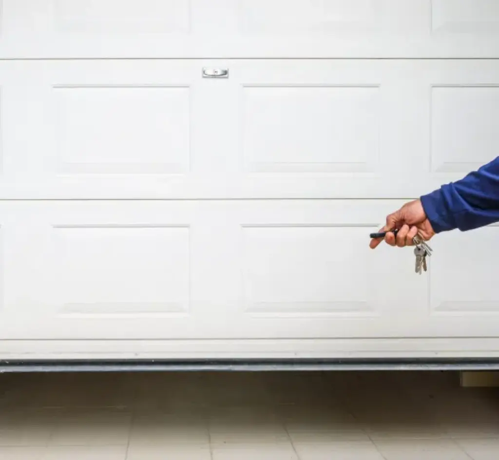 person using garage door remote control