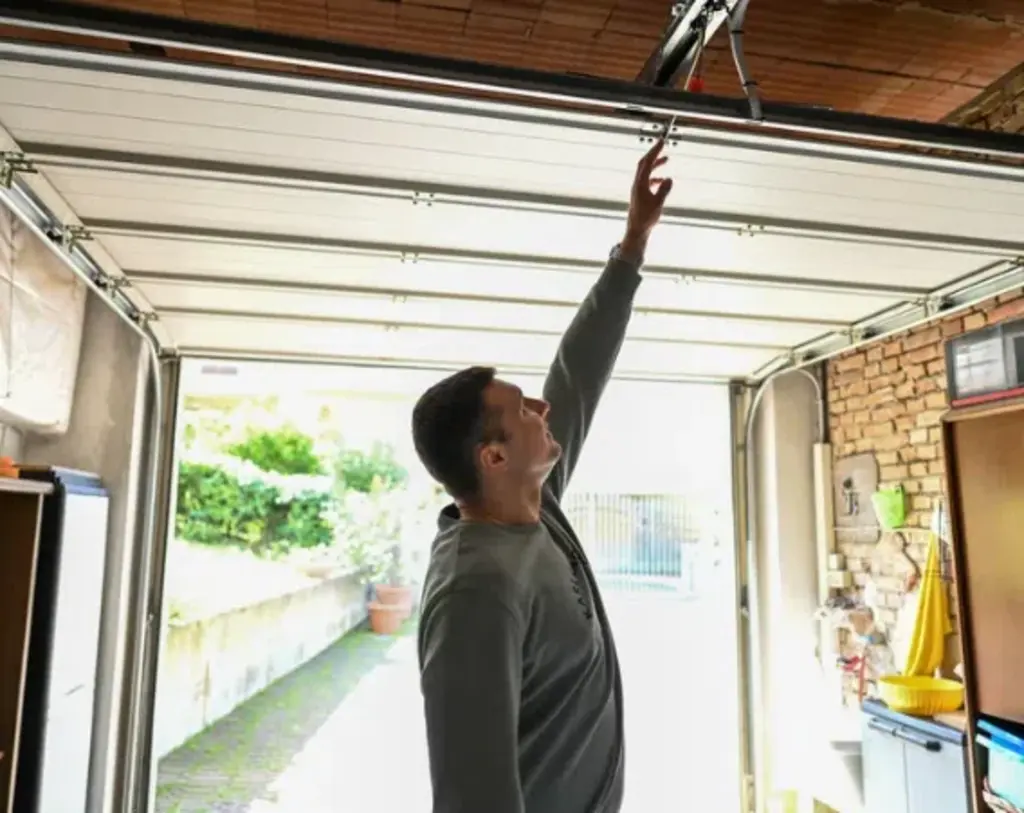owener of the garage door reaching the top