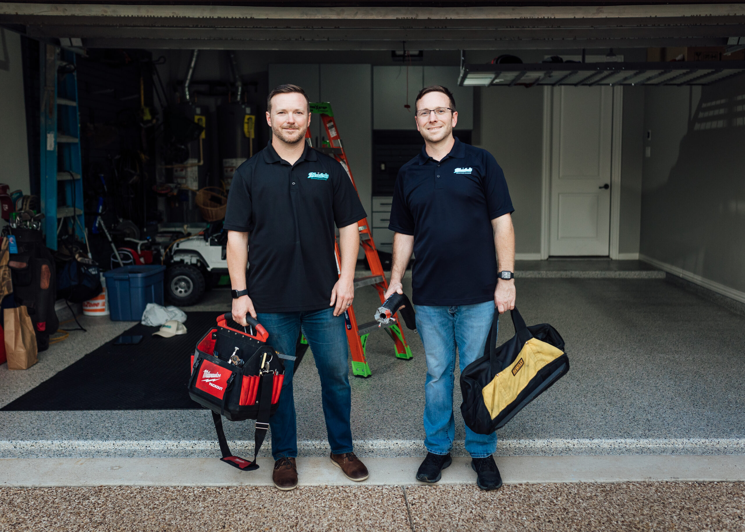 Aaron and Jason Meadows on a garage door install job