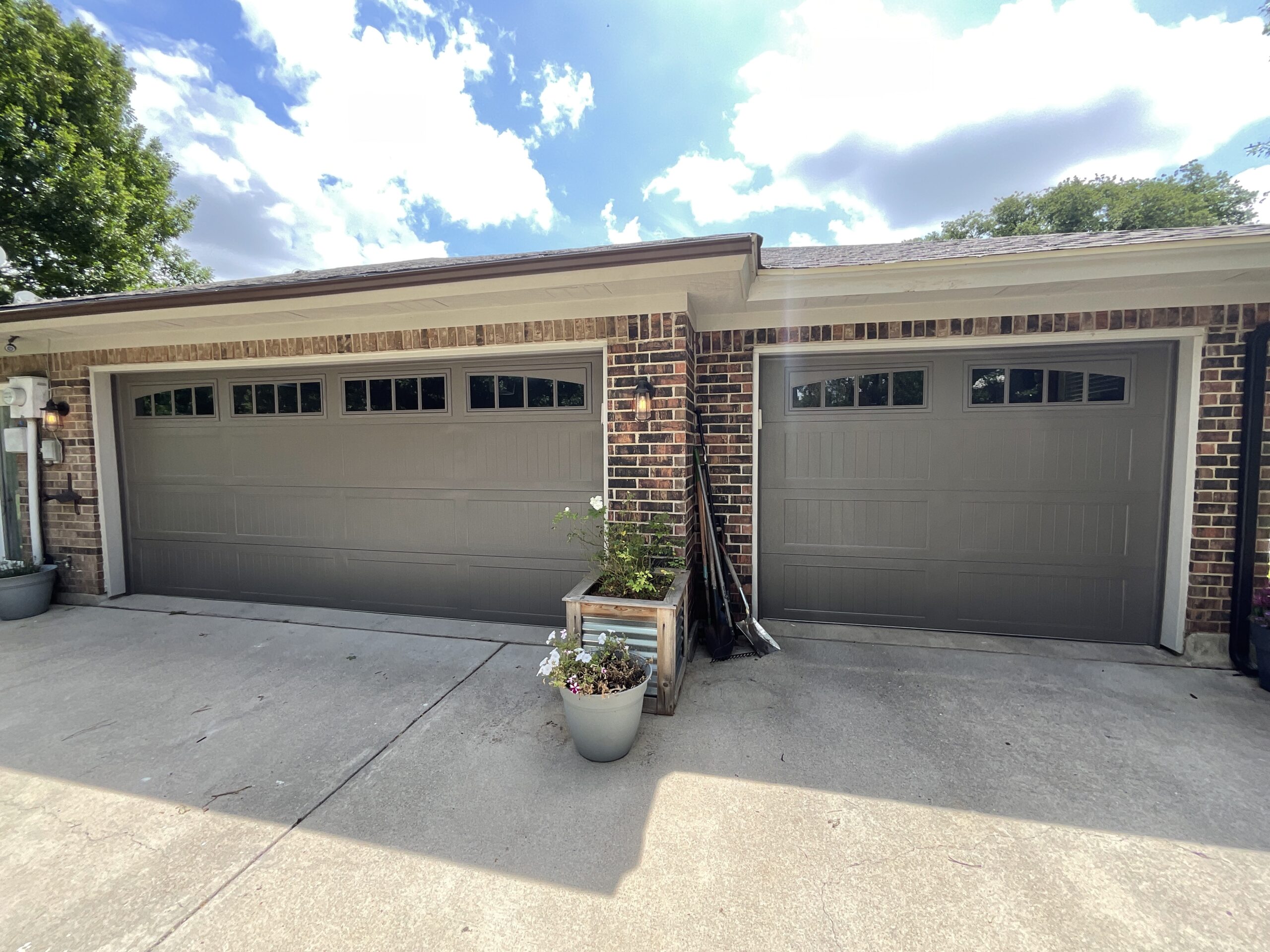 traditional metal garage doors with windows